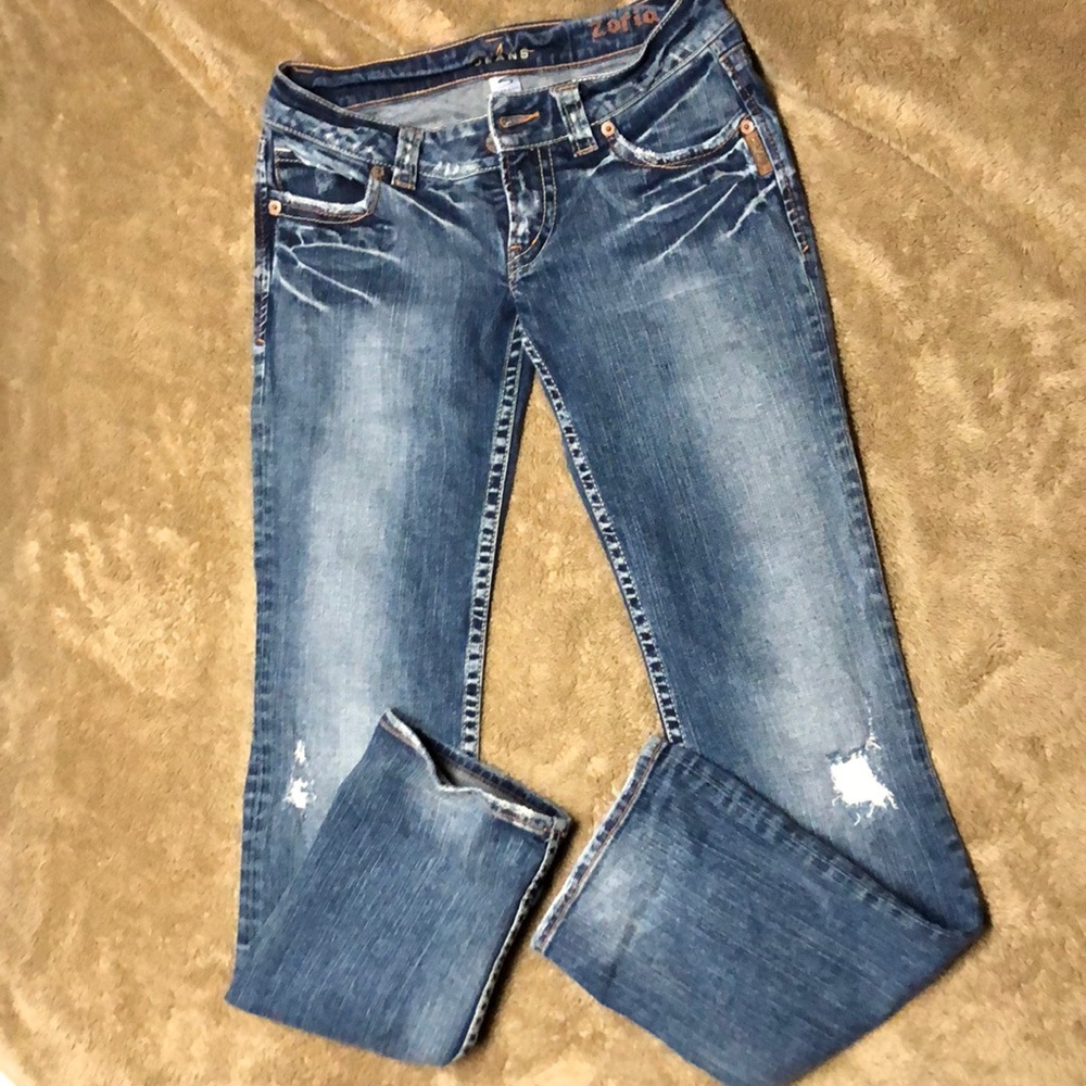 Women’s sliver jeans with studded pockets